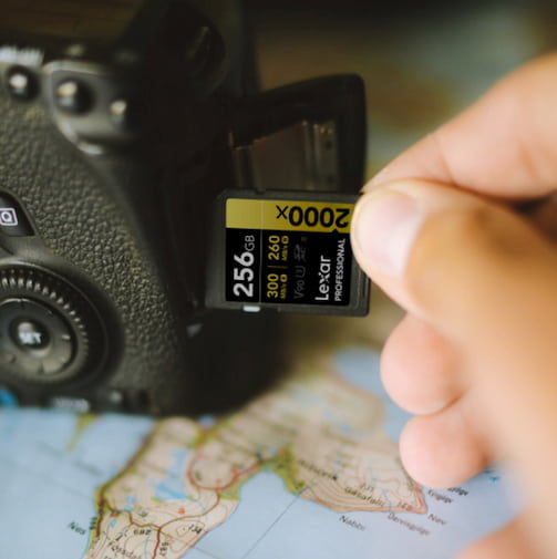 A photographer using a Lexar 2000X Memory Card.