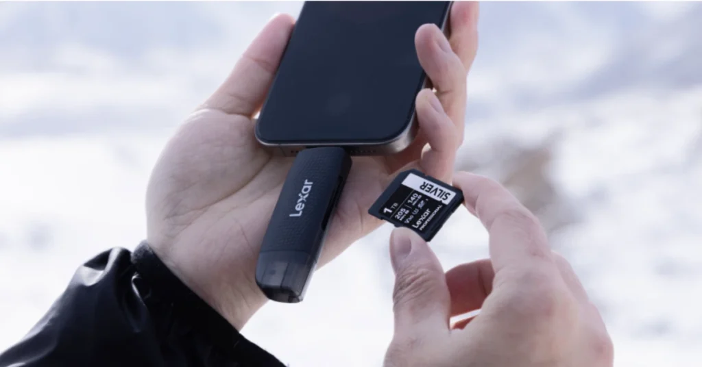 Lexar dual-slot SD card reader with microSD card being inserted for iPhone photo transfer